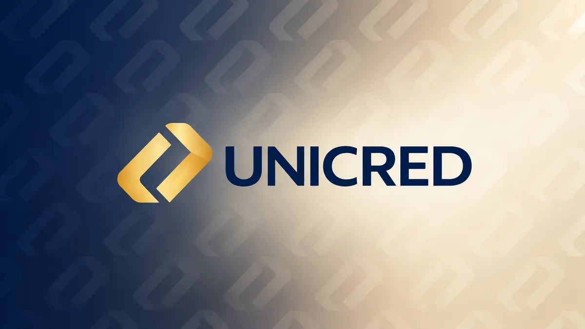 Logotipo da Unicred em composição institucional azul-marinho e dourada